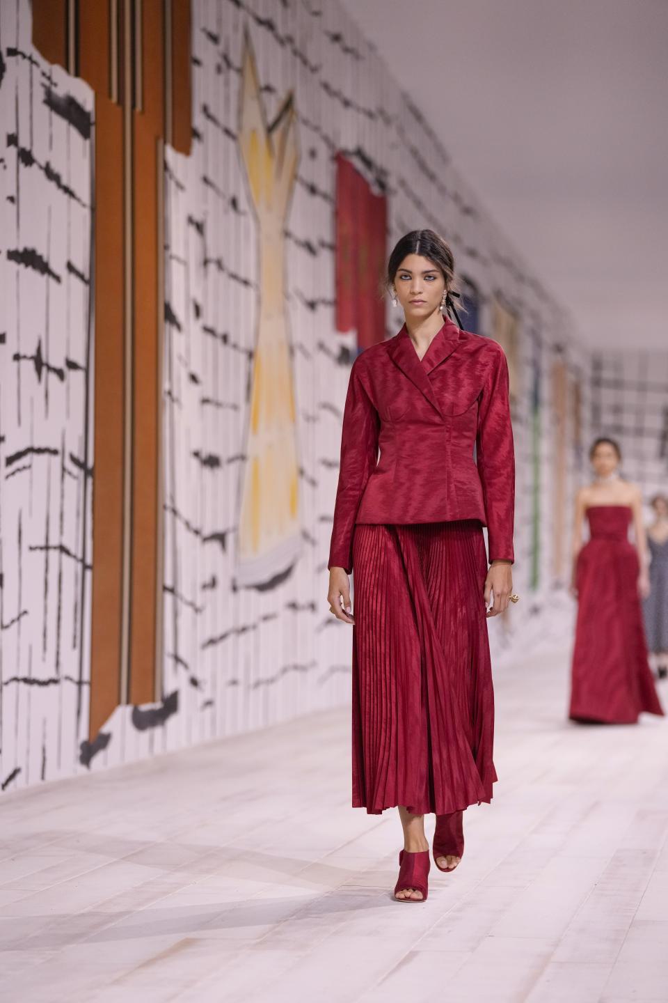 A model wears a creation for Christian Dior as part of the Haute Couture Spring-Summer 2024 collection presented in Paris, Monday, Jan. 22, 2024. (AP Photo/Thibault Camus)