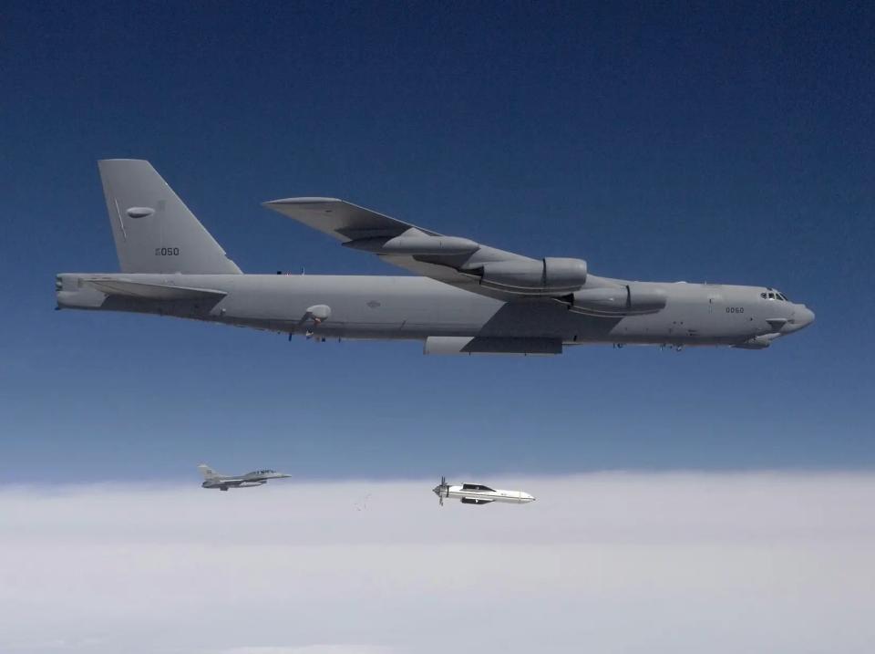 A B-52 releases a test version of the Massive Ordnance Penetrator (MOP) during a test of the weapon over White Sands Missile Range, New Mexico, in 2009. <em>DoD</em>