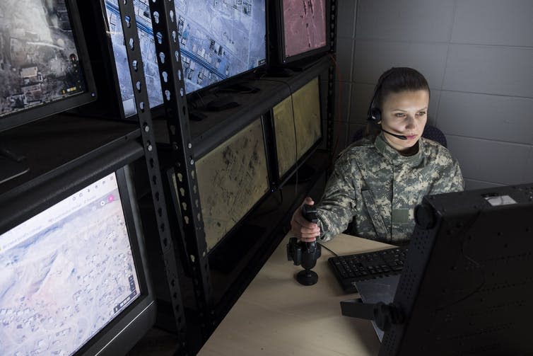 <span class="caption">Humans still press the trigger, but for how long?</span> <span class="attribution"><a class="link " href="https://www.shutterstock.com/image-photo/female-military-drone-operator-wide-shot-539931541?src=eQqZybPxaHhkvow-YSqfIA-1-1" rel="nofollow noopener" target="_blank" data-ylk="slk:Burlingham/Shutterstock;elm:context_link;itc:0;sec:content-canvas">Burlingham/Shutterstock</a></span>