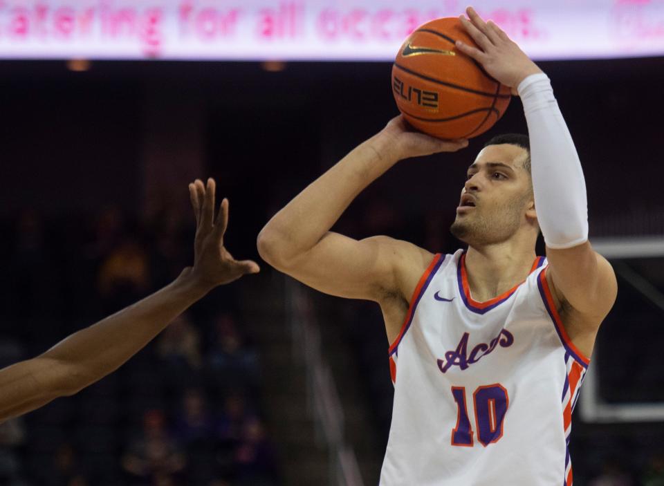 Evansville’s Yacine Toumi (10) takes a shot as the University of Evansville Purple Aces play the University of Illinois at Chicago Flames at Ford Center in Evansville, Ind., Wednesday, Feb. 22, 2023. 