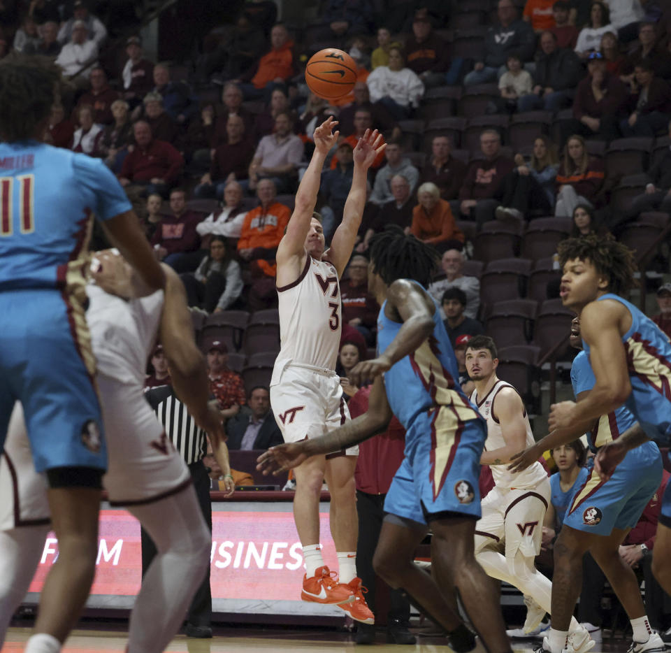 Virginia Tech's Sean Pedulla (3) shoots against Florida State during the first half of an NCAA college basketball game Tuesday, Feb. 13, 2024, in Blacksburg, Va. (Matt Gentry/The Roanoke Times via AP)