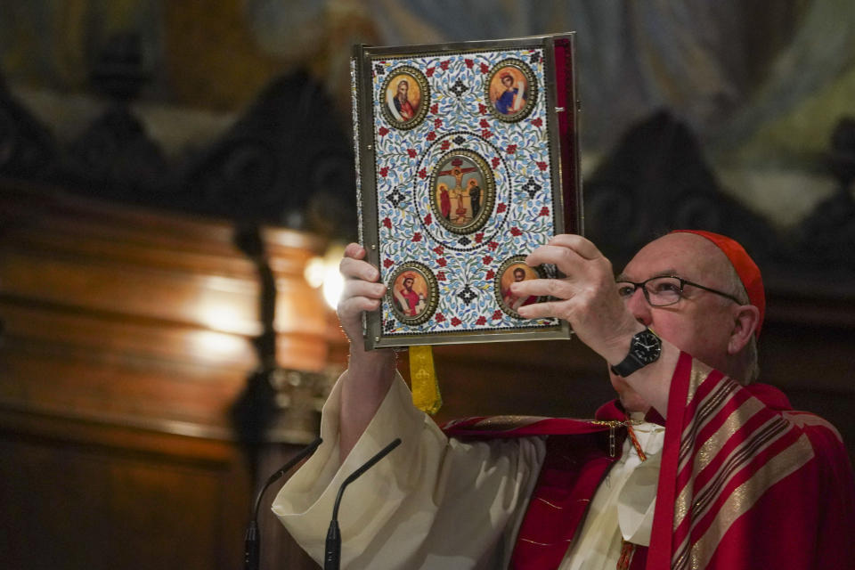 US Cardinal Kevin Joseph Farrell presides over a vigil service over the death of George Floyd, a black man who died after being restrained by Minneapolis police officers on May 25, in Rome's Santa Maria in Trastevere Church, Friday, June 5, 2020. Cardinal Farrell says the killing of George Floyd has laid bare that the Christian principles of the U.S. Constitution aren’t being applied to blacks, and is evidence that divisive, demonizing language can kill. (AP Photo/Andrew Medichini)