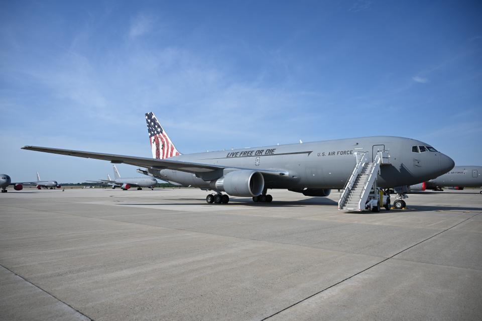A KC-46A Pegasus, dubbed the Spirit of Portsmouth and emblazoned with a colorful new paint job, sits on the runway at Pease Air National Guard Base. The paint job was crafted to honor both the 75th anniversary of the U.S. Air Force and the 400th anniversary of the founding of Portsmouth, showcasing the wing's National Guard heritage and rich history in the state of New Hampshire.