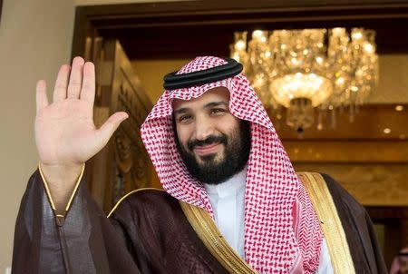 Saudi Deputy Crown Prince Mohammed bin Salman waves as he meets with Philippine President Rodrigo Duterte in Riyadh, Saudi Arabia, April 11, 2017. Bandar Algaloud/Courtesy of Saudi Royal Court/Handout/Files