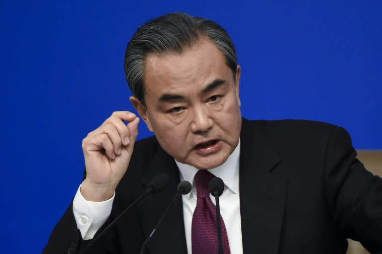 China's Foreign Minister Wang Yi answers a question at a press conference during the Fifith Session of the 12th National People's Congress (NPC) in Beijing on March 8, 2017