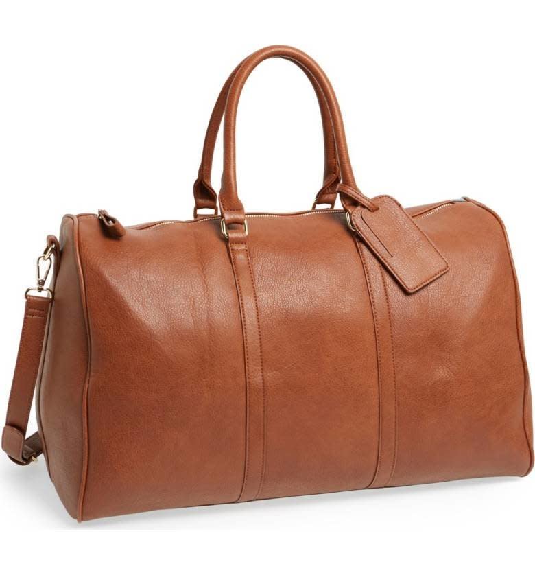 Upgrade your weekend travel look with a refined faux leather travel bag. <strong><a href="https://shop.nordstrom.com/s/sole-society-lacie-faux-leather-duffel-bag/3846051" target="_blank" rel="noopener noreferrer">Get it here</a></strong>.