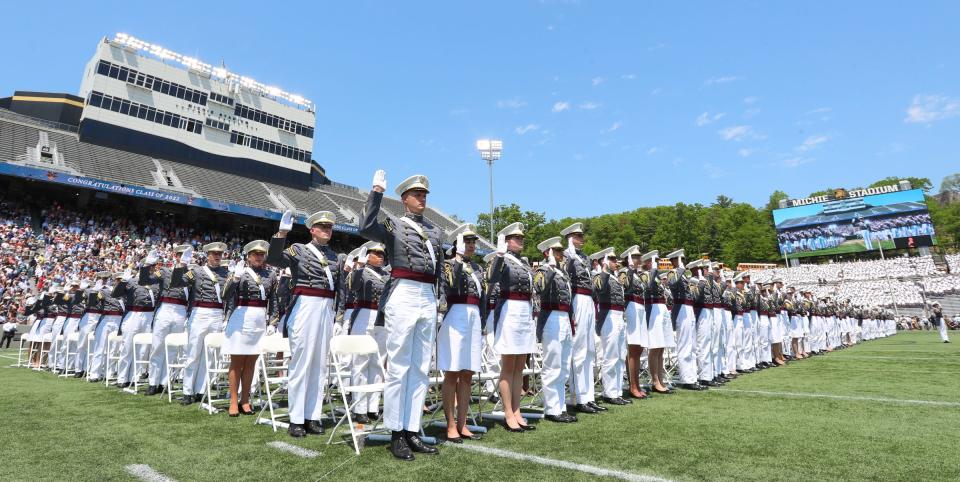 Cadets take the oath of office during the 2022 graduation and commissioning ceremony at the U. S. Military Academy at West Point.