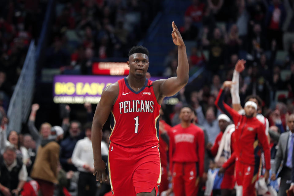 New Orleans Pelicans forward Zion Williamson (1) reacts after making a 3-point basket in the second half of an NBA basketball game against the San Antonio Spurs in New Orleans, Wednesday, Jan. 22, 2020. The Spurs won 121-117. (AP Photo/Gerald Herbert)