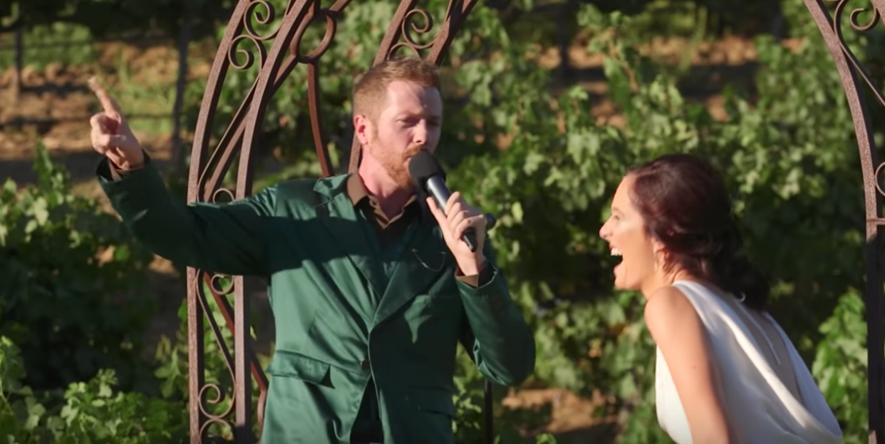 Will Jones surprised his wedding guests by rapping his wedding vows, but then his wife, Meg, took the mic. (Photo: YouTube)