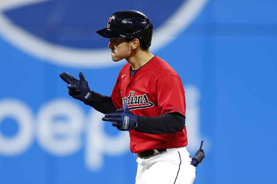 Cleveland Guardians' Steven Kwan celebrates his RBI double off Tampa Bay Rays relief pitcher Shawn Armstrong during the eighth inning of a baseball game Thursday, Sept. 29, 2022, in Cleveland. (AP Photo/Ron Schwane)