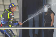 MotoGP Yamaha rider Valentino Rossi of Italy celebrates 3rd place during the Andalucia Motorcycle Grand Prix at the Angel Nieto racetrack in Jerez de la Frontera, Spain, Sunday July 26, 2020. (AP Photo/David Clares)