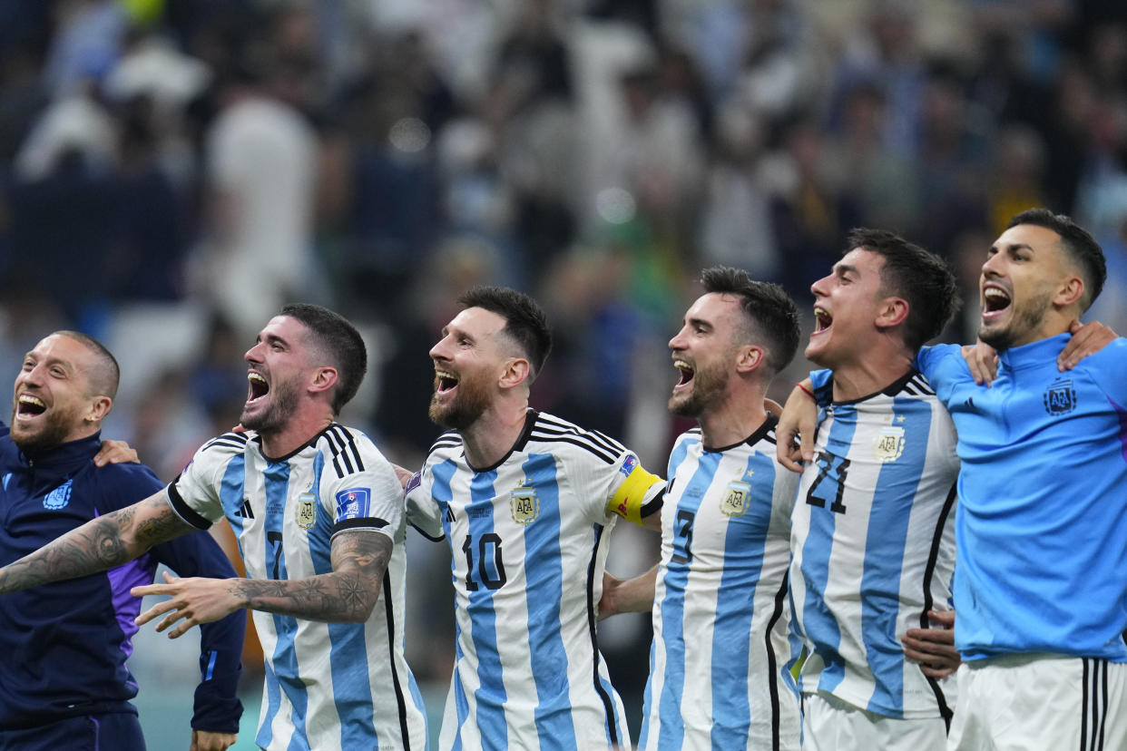Argentina&#39;s Lionel Messi (10) and teammates celebrate after defeating Croatia 3-0 in a World Cup semifinal soccer match at the Lusail Stadium in Lusail, Qatar, Tuesday, Dec. 13, 2022. (AP Photo/Natacha Pisarenko)