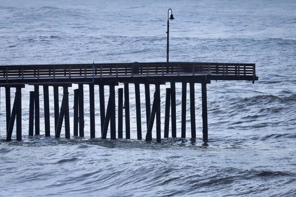 The Cayucos Pier lost five pilings in a February 2024 storm that left the end of the structure dangling over the ocean. The pier has been mostly reopened with the end closed off. The county hopes to complete full repairs by the fall ahead of next winter’s storms.