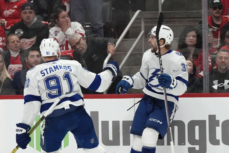 Tampa Bay Lightning left wing Brandon Hagel (38) celebrates his goal during the first period of an NHL hockey game against the Detroit Red Wings, Saturday, Oct. 14, 2023, in Detroit. (AP Photo/Carlos Osorio)