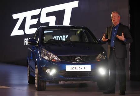 Tim Leverton, Tata Motors' head of research and development, gestures after unveiling Sedan Zest car in New Delhi February 3, 2014. REUTERS/Anindito Mukherjee/Files