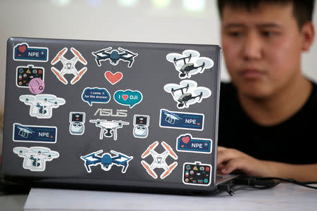 An instructor uses his laptop during a training at LTFY drone training school on the outskirts of Beijing, China July 27, 2017. Picture taken July 27, 2017. REUTERS/Jason Lee