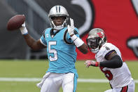 Carolina Panthers quarterback Teddy Bridgewater (5) is pressured by Tampa Bay Buccaneers linebacker Devin White (45) as he throws a pass during the second half of an NFL football game Sunday, Sept. 20, 2020, in Tampa, Fla. (AP Photo/Mark LoMoglio)