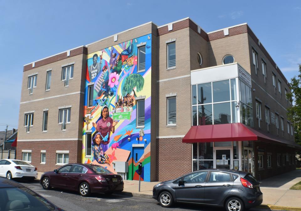 Muralist Cesar Viveros has created a three-story mural on a building on South 5th Street at Martin Luther King Boulevard in Camden.