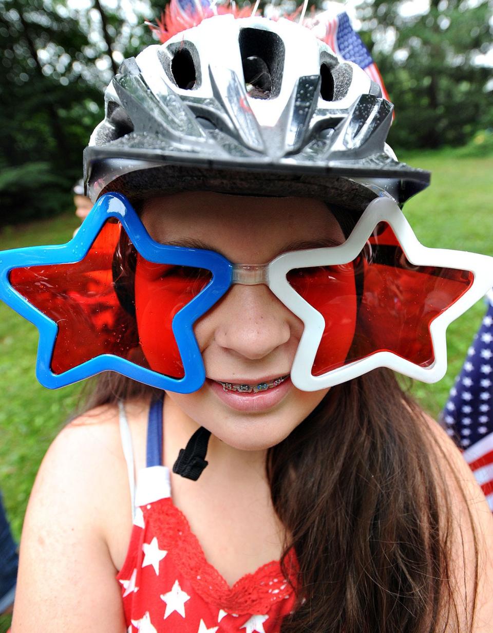 Genevieve Moyles, 10, or Dickson City, donned her star-spangled sunglasses Saturday, July 4, 2015, at the annual Old-Fashioned Fourth of July Celebration at Fonthill Museum in Doylestown.
