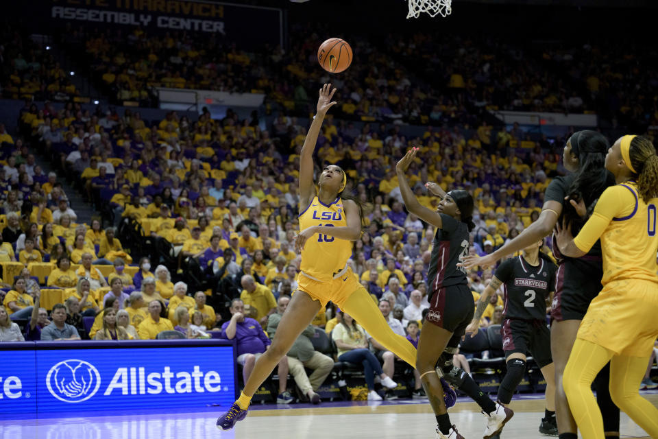 LSU forward Angel Reese (10) shoots against Mississippi State forward Denae Carter (25) in the first half of a women's NCAA basketball game Sunday, Feb. 26, 2023, in Baton Rouge, La. (AP Photo/Matthew Hinton)