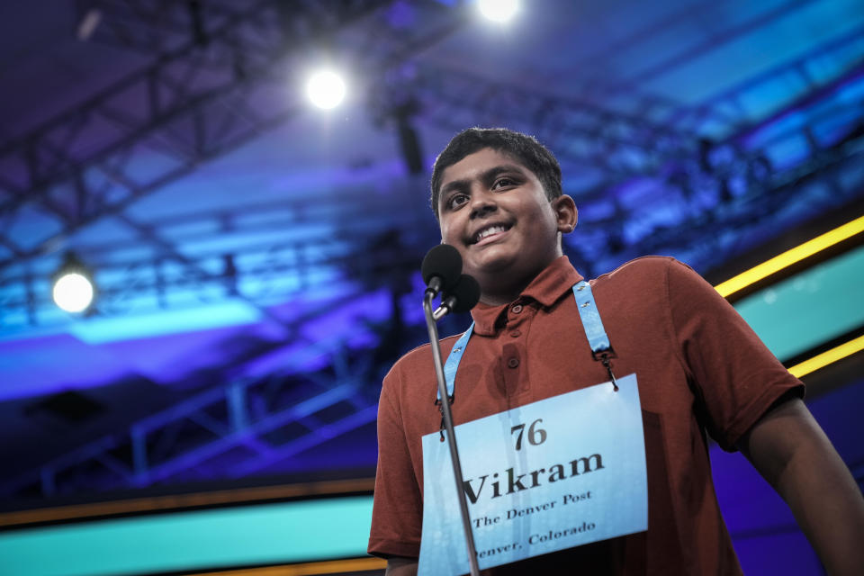 12-year-old Vikram Raju from Denver, Colorado, reacts after spelling a word correctly during the Scripps National Spelling Bee at the Gaylord National Harbor Resort on June 1, 2022 in Oxon Hill, Maryland. 234 spellers are competing in the first fully in-person Bee since 2019. / Credit: Drew Angerer/Getty Images