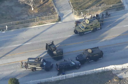 An SUV with its windows shot out that police suspect was the getaway vehicle from at the scene of a shooting in San Bernardino, December 2, 2015. REUTERS/Mario Anzuoni