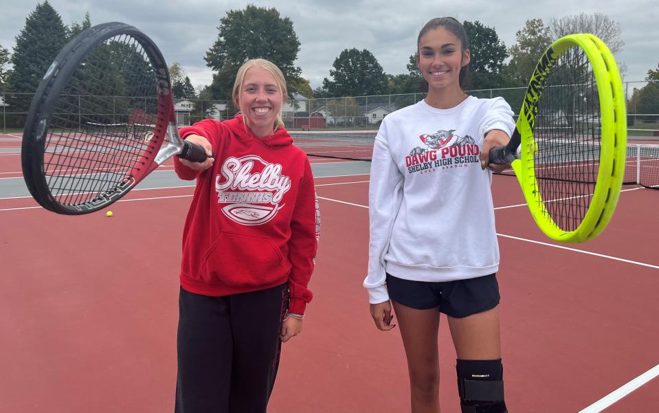 Shelby juniors Annie Mahek (left) and Bella Carver (right) became the first Shelby doubles team to qualify for state in 30 years and the first Whippet tennis qualifiers in 15 years.