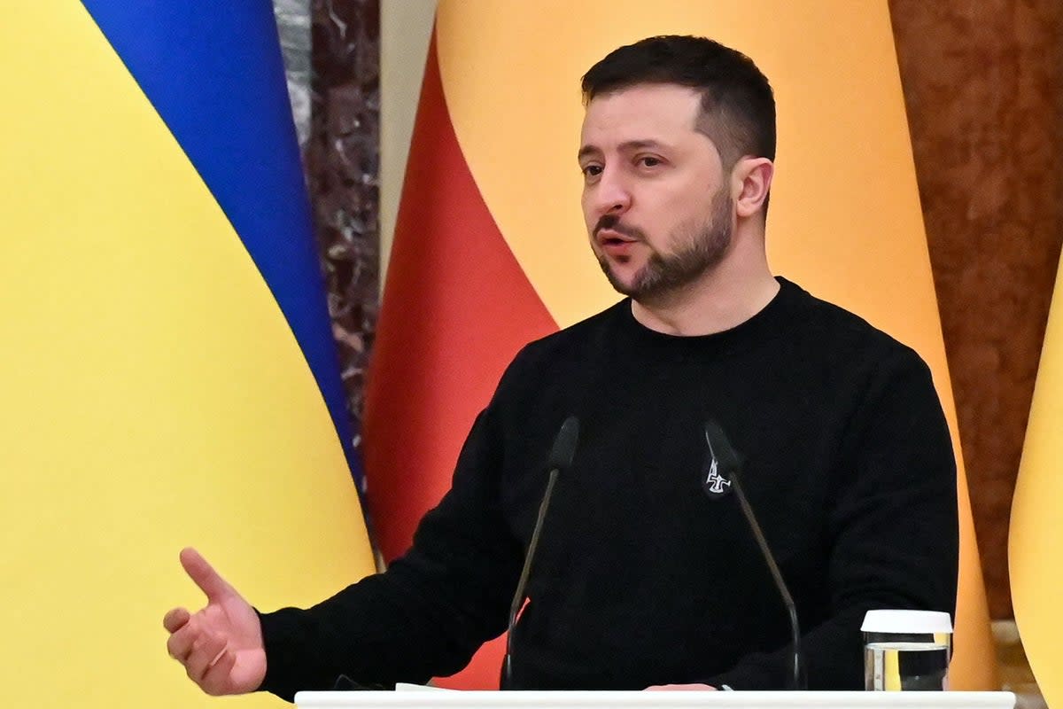 Volodymyr Zelensky speaks during a press conference on Thursday  (AFP via Getty Images)