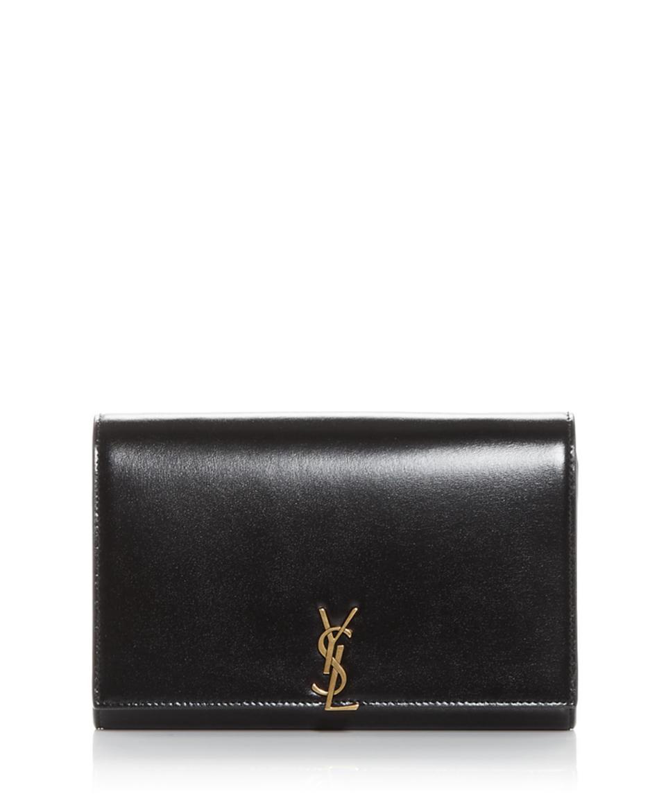 <p><strong>Saint Laurent</strong></p><p>bloomingdales.com</p><p><strong>$1350.00</strong></p><p><a href="https://go.redirectingat.com?id=74968X1596630&url=https%3A%2F%2Fwww.bloomingdales.com%2Fshop%2Fproduct%2Fsaint-laurent-monogram-leather-chain-wallet%3FID%3D4180543&sref=https%3A%2F%2Fwww.townandcountrymag.com%2Fstyle%2Ffashion-trends%2Fg38304908%2Fhow-to-dress-like-lady-gaga-house-of-gucci%2F" rel="nofollow noopener" target="_blank" data-ylk="slk:Shop Now;elm:context_link;itc:0;sec:content-canvas" class="link ">Shop Now</a></p><p>As you've probably guessed by our collection of photos from the film, Gaga's character Reggiani likes to carry around a clutch at all times.</p>