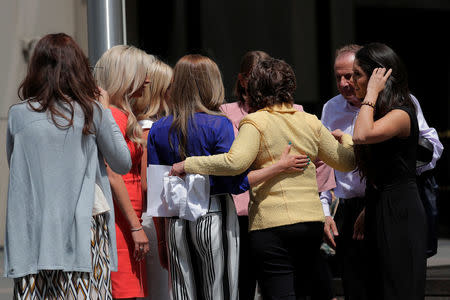 Attorney Gloria Allred embraces several former Houston Texans cheerleaders outside of NFL headquarters in New York, U.S., June 4, 2018. REUTERS/Lucas Jackson