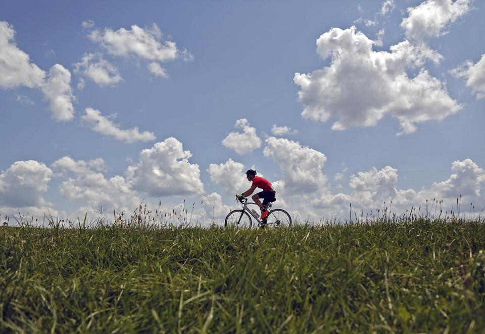 A Pelotonia rider head up a hill north of Granville on the 100-mile route in 2019.