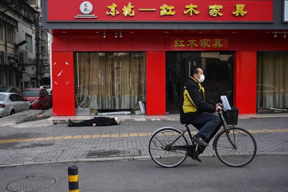 China Covid Wuhan (Hector Retamal / AFP via Getty Images file)