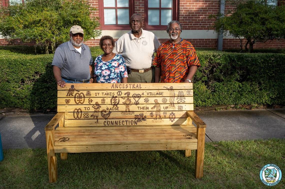 Artist Hank Herring, far right, poses with Washington Street Park sponsors with “Ancestral Connection.” Herring is the owner of Green Herring Art and Framing Studio on Bay Street. Photo provided