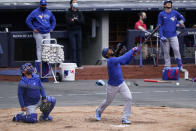 Toronto Blue Jays Teoscar Hernandez reacts as he pops up during batting practice in a workout, Wednesday, March 31, 2021, at Yankee Stadium in New York. The Blue Jays face the New York Yankees on opening day Thursday in New York. (AP Photo/Kathy Willens)