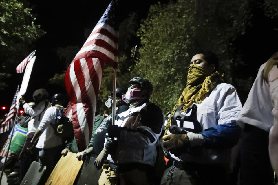 Veteranos militares participan en una protesta del movimiento Black Lives Matter en el tribunal federal Mark O. Hatfield, el 30 de julio de 2020, en Portland, Oregon. (AP Foto/Marcio Jose Sanchez)