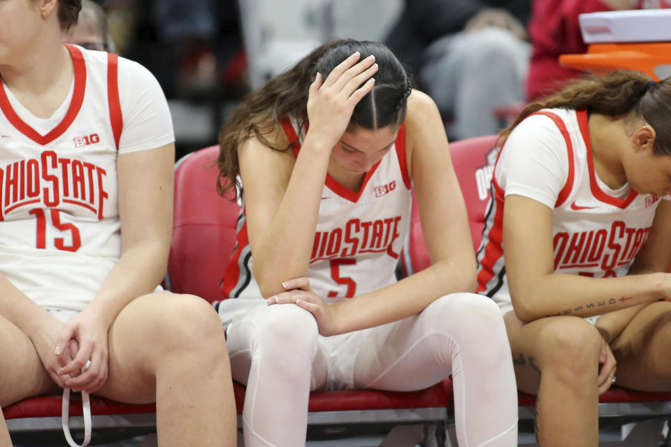 Ohio State guard Emma Shumate, center, reacts as time winds down during the second half of an NCAA college basketball game against Iowa at Value City Arena in Columbus, Ohio, Monday, Jan. 23, 2023. (AP Photo/Joe Maiorana)