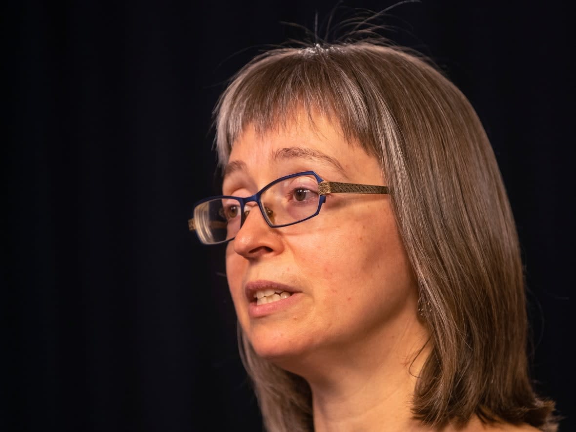 Dr. Deena Hinshaw, Alberta's chief medical officer of health, said the Alberta government, in the future, will not publicly report any COVID-19 deaths in anyone under 18 until a review of the death has been completed. (Jason Franson/The Canadian Press - image credit)