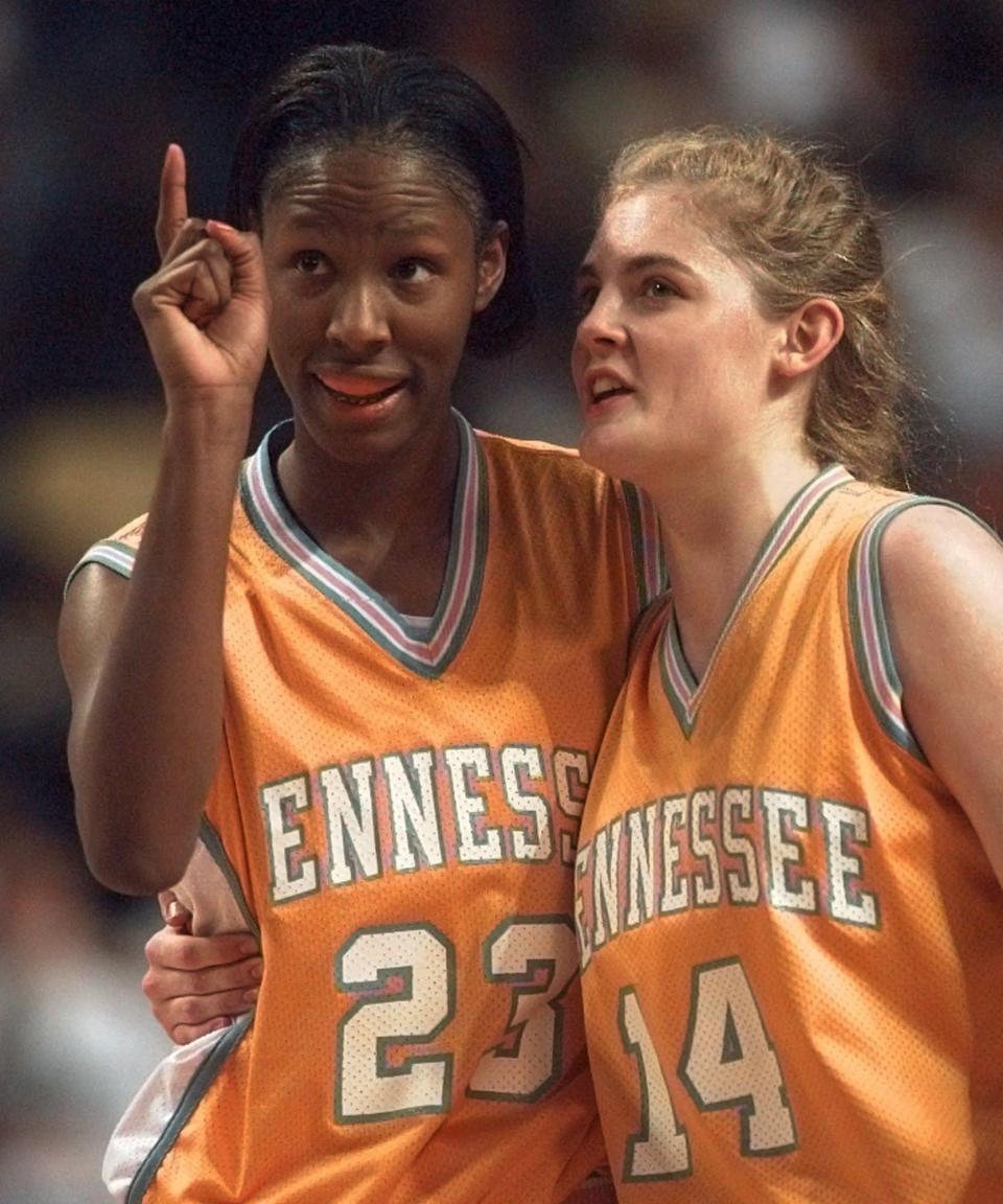 Tennessee's Chamique Holdsclaw (23) and Kellie Jolly (14) embrace after they defeated Old Dominion 68-59 to win the NCAA Division I Women's Final Four Tournament Sunday, March 30, 1997, in Cincinnati.
(AP Photo/Amy Sancetta)