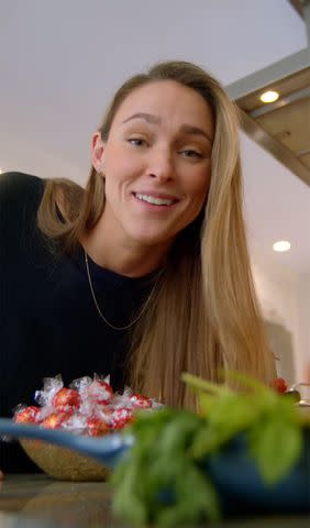 <p>Lindt Chocolate USA</p> Kylie Kelce with Lindt LINDOR truffles