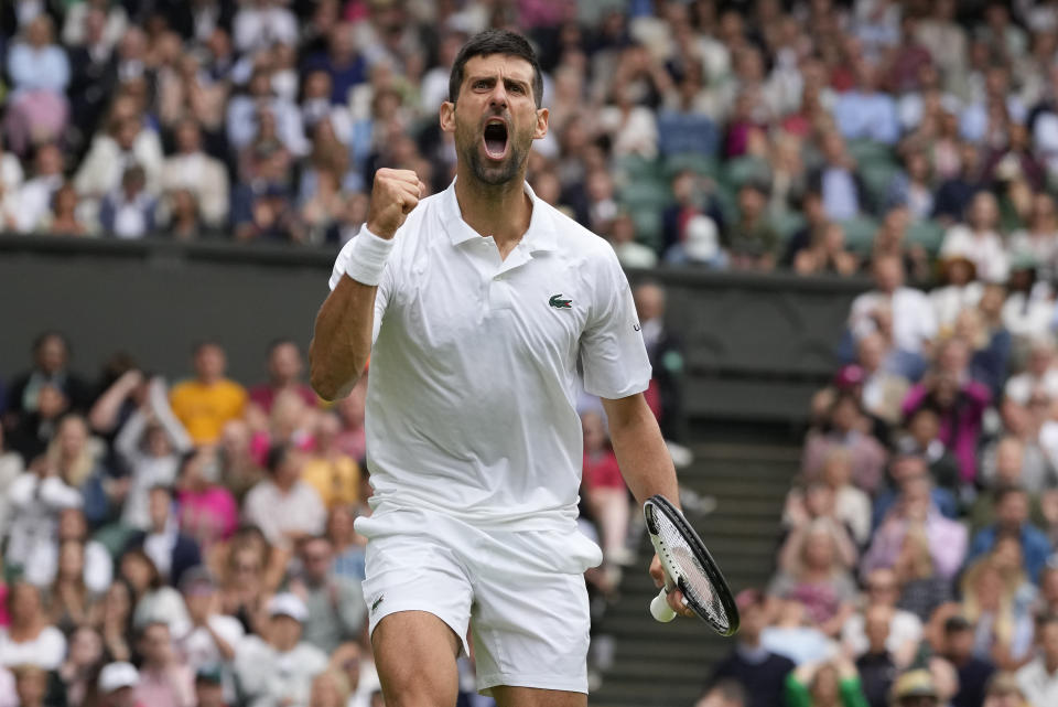 Novak Djokovic festeja tras ganar un punto ante Andrey Rublev en los cuartos de final del torneo de Wimbledon, el martes 11 de julio de 2023, en Londres. (AP Foto/Kirsty Wigglesworth)