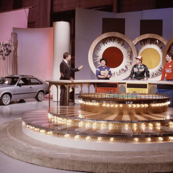 PHOTO: Pat Sajak with unknown contestants on the Wheel of Fortune in the 1980s. (Gene Arias/NBCU Photo Bank via Getty Images, FILE)