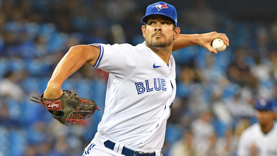 TORONTO, ON - AUGUST 24: Toronto Blue Jays Pitcher Brad Hand (52) pitches during the regular season MLB game between the Chicago White Sox and Toronto Blue Jays on August 24, 2021 at Rogers Centre in Toronto, ON. (Photo by Gerry Angus/Icon Sportswire via Getty Images)