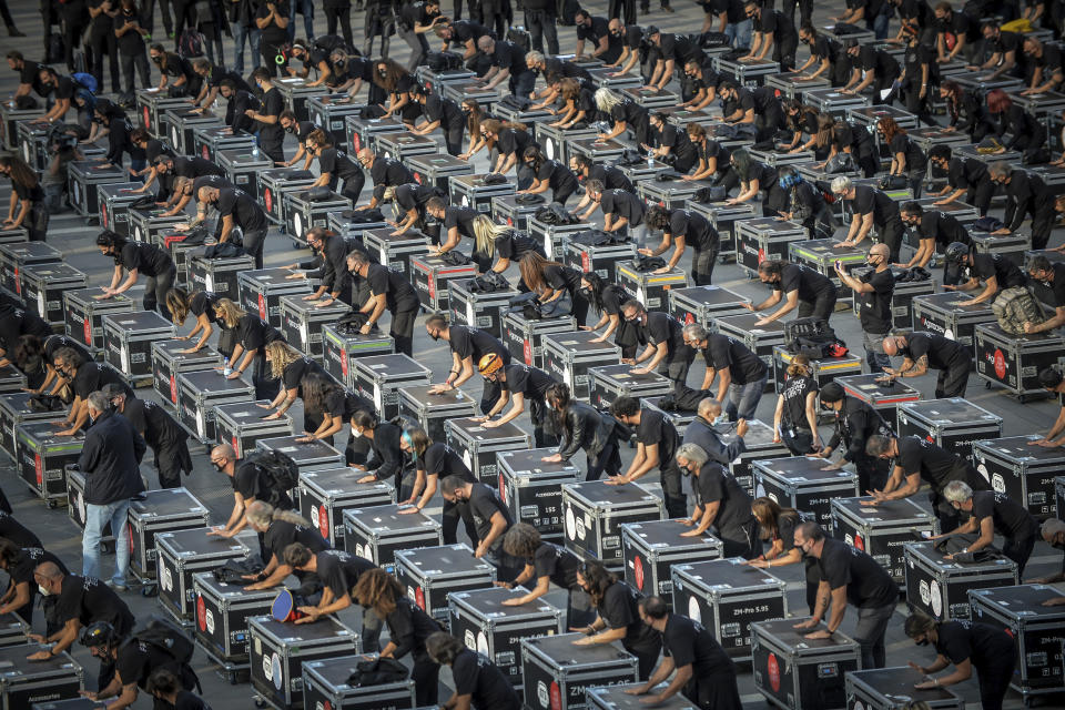 Entertainment workers protest against the Italian government's economic policies to combat the spread of COVID-19, in Milan, Italy, Saturday, Oct 10, 2020. (Claudio Furlan/Lapresse via AP)