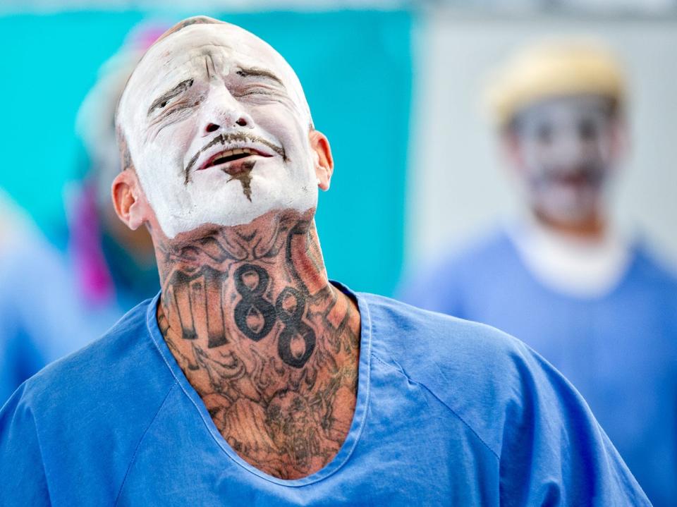 Peter Merts photos show California Prison Arts Programs A theater student wearing face paint emotes at Ironwood State Prison - 2018