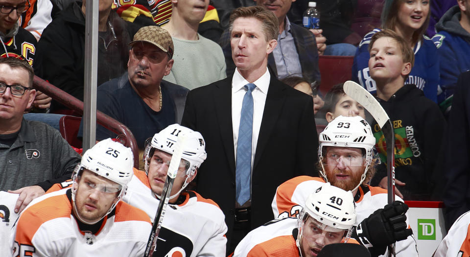 The current employment status of Flyers head coach Dave Hakstol is about as clear as mud. (Photo by Jeff Vinnick/NHLI via Getty Images)