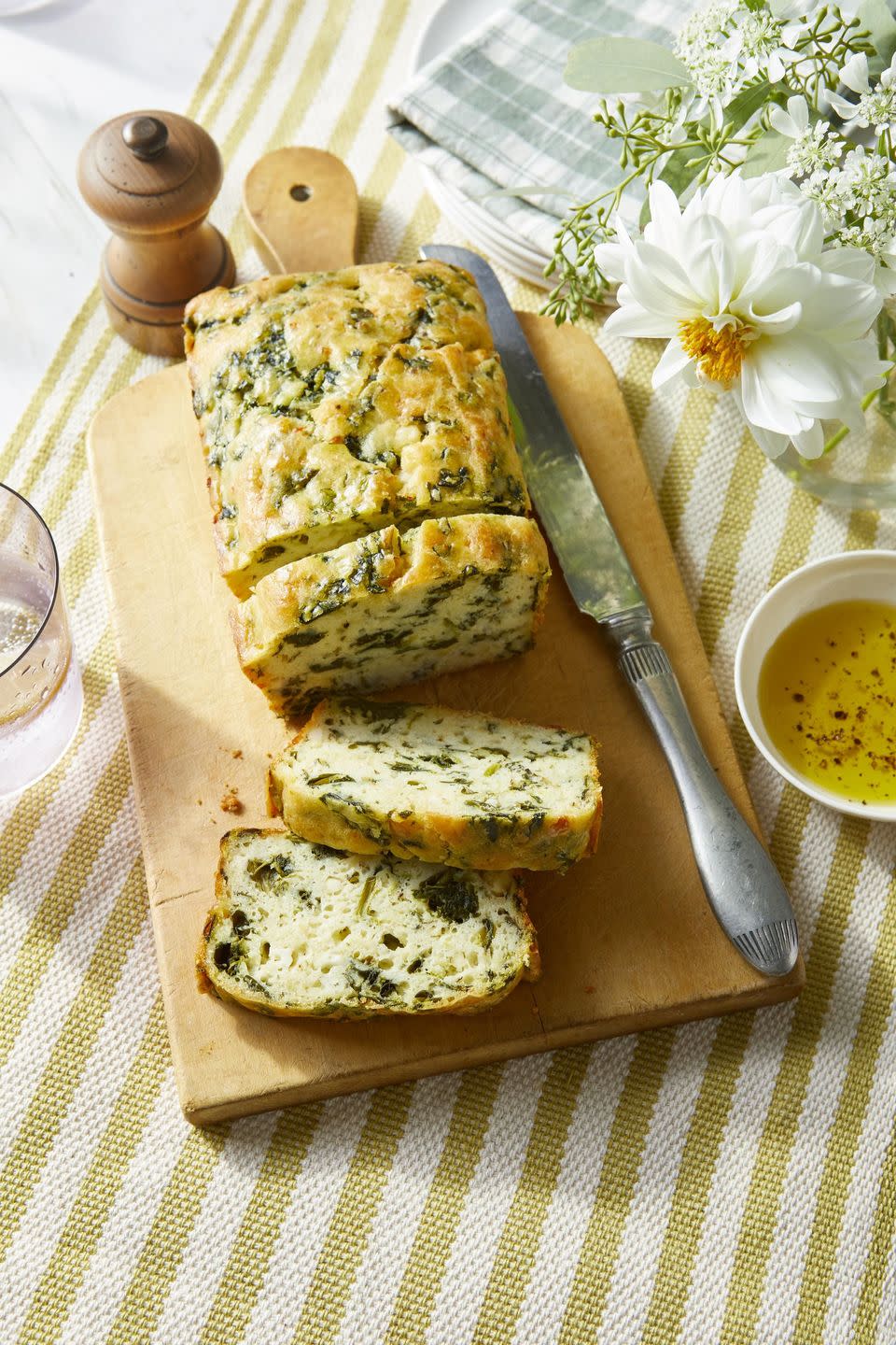 <p>You wouldn't necessarily think a slice or two of bread, all by itself, would make a filling lunch, but this quick bread is packed with nutritious spinach and tasty feta cheese, making it more of a meal.</p><p><strong><a href="https://www.countryliving.com/food-drinks/a34946991/spinach-and-feta-quick-bread-recipe/" rel="nofollow noopener" target="_blank" data-ylk="slk:Get the recipe for Spinach and Feta Quick Bread;elm:context_link;itc:0;sec:content-canvas" class="link ">Get the recipe for Spinach and Feta Quick Bread</a>.</strong></p>