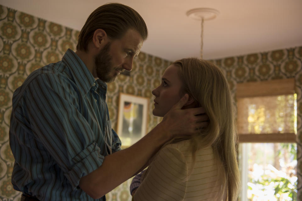 Bill Heck, left, and Rachel Brosnahan appear in a scene from the film "I'm Your Woman." (Wilson Webb/Amazon Studios via AP)