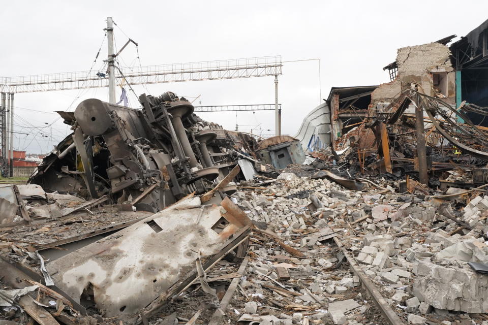 Debris of a railway depot ruined after a Russian rocket attack in Kharkiv, Ukraine, Wednesday, Sept. 28, 2022. (AP Photo/Andrii Marienko)