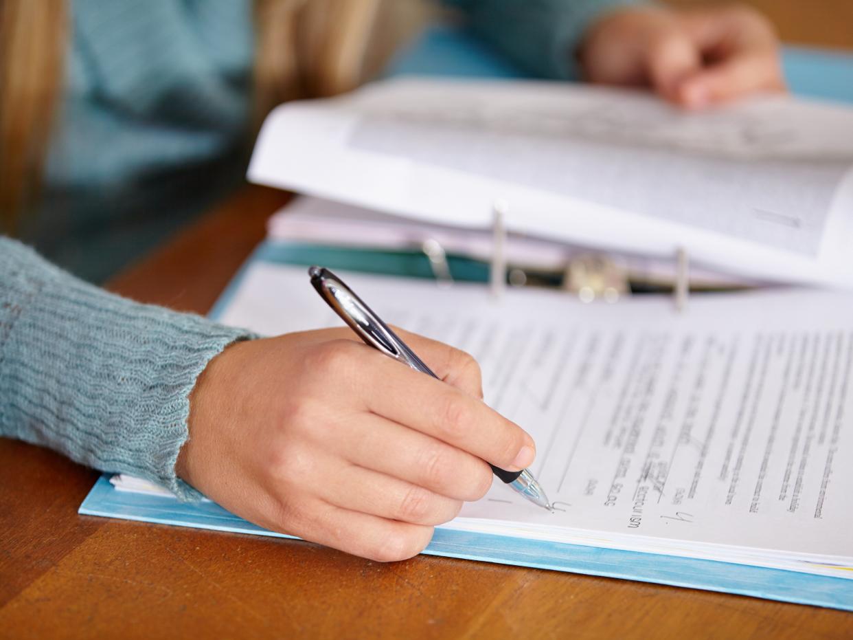 <p>Seven per cent of schools who replied to a union survey said they would base grades solely on papers taken in exam-style conditions this year</p> (Getty Images)