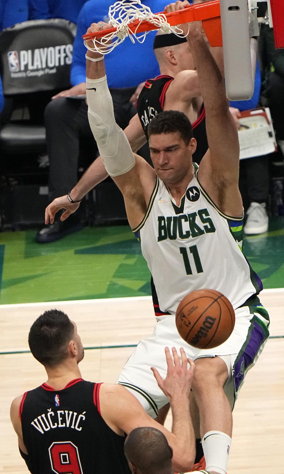 Brook Lopez slams home a basket against the Chicago Bulls during the first-round playoff series in 2022.